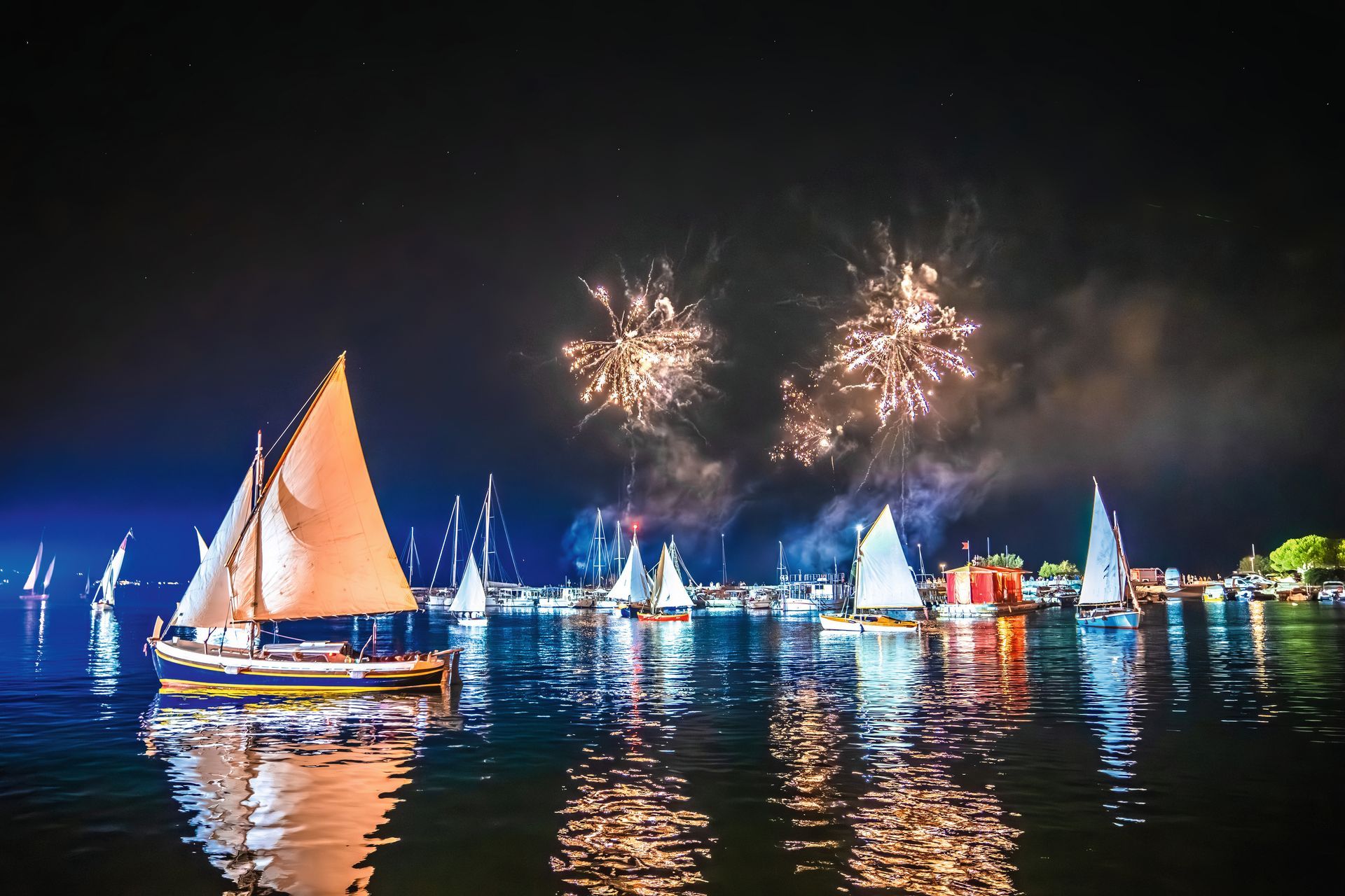 Krk historic sails night regatta with illumination and fireworks, Island of Krk, Croatia
